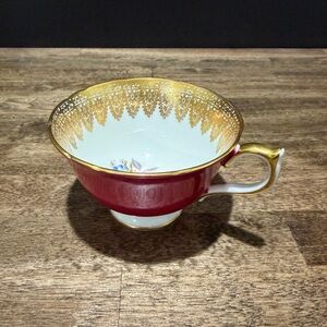 Elegant Red and Gold Teacup